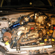 Illustration for article titled Garage Mechanic Ghetto-Rigs Subaru Impreza With Eaton Supercharger